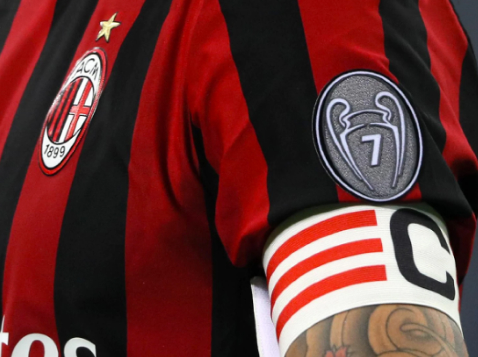 The AC Milan captain wearing their kit with a UCL badge with the number 7 on it.