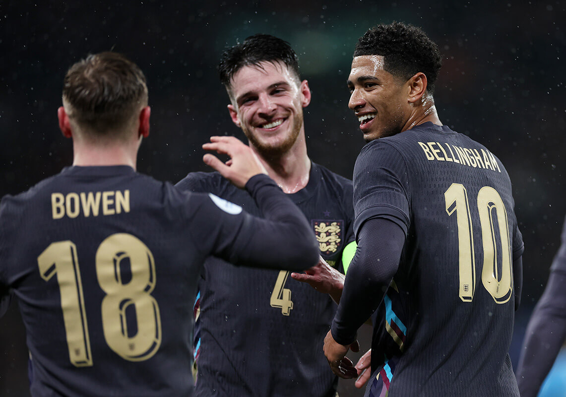 Image showing three England players wearing the official team font