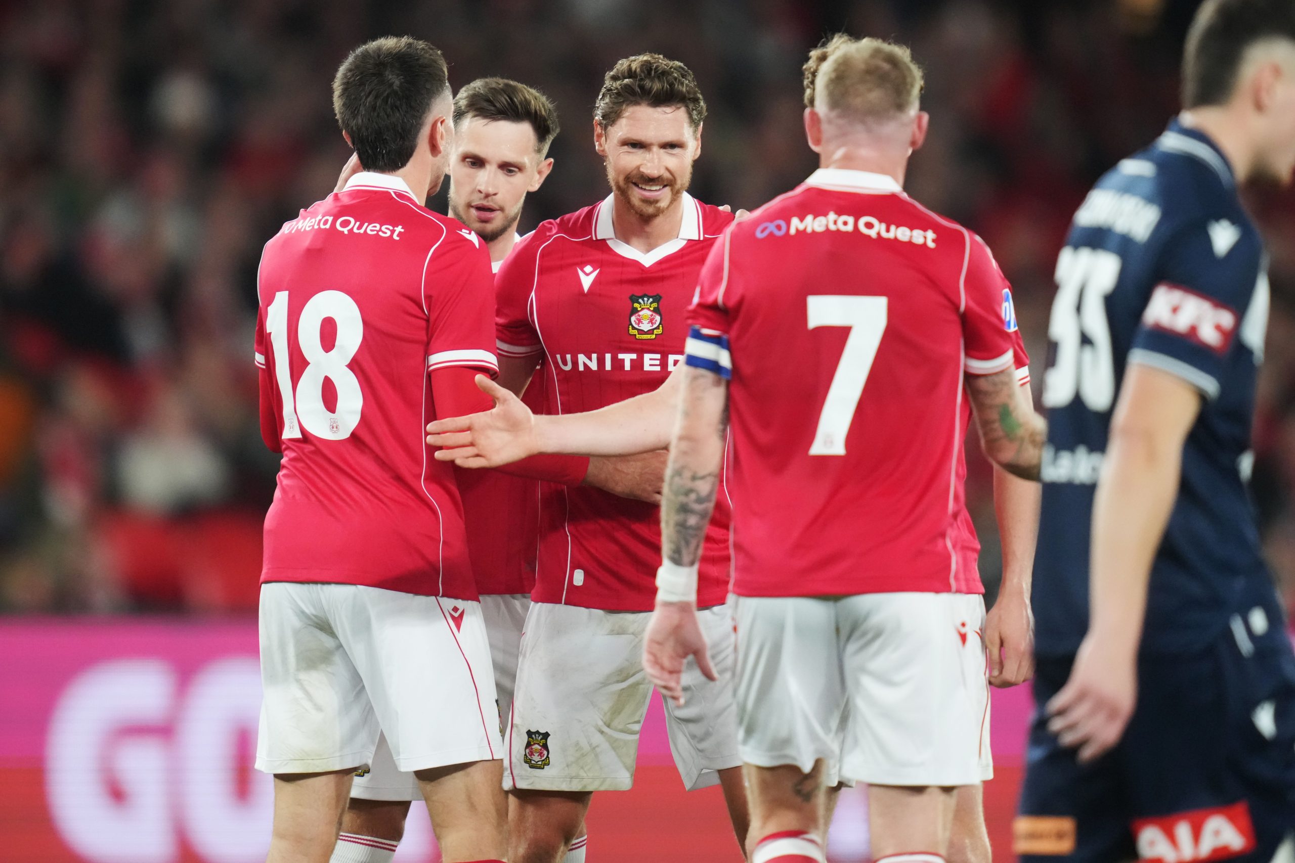 Image showing Wrexham players celebrating with numbers manufactured by ID UNLIMITED