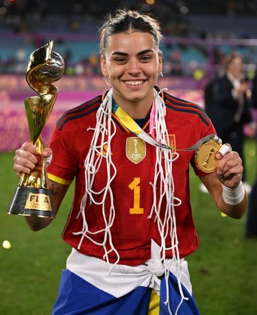 Image showing a Spanish Women's tema player posing with a trophy