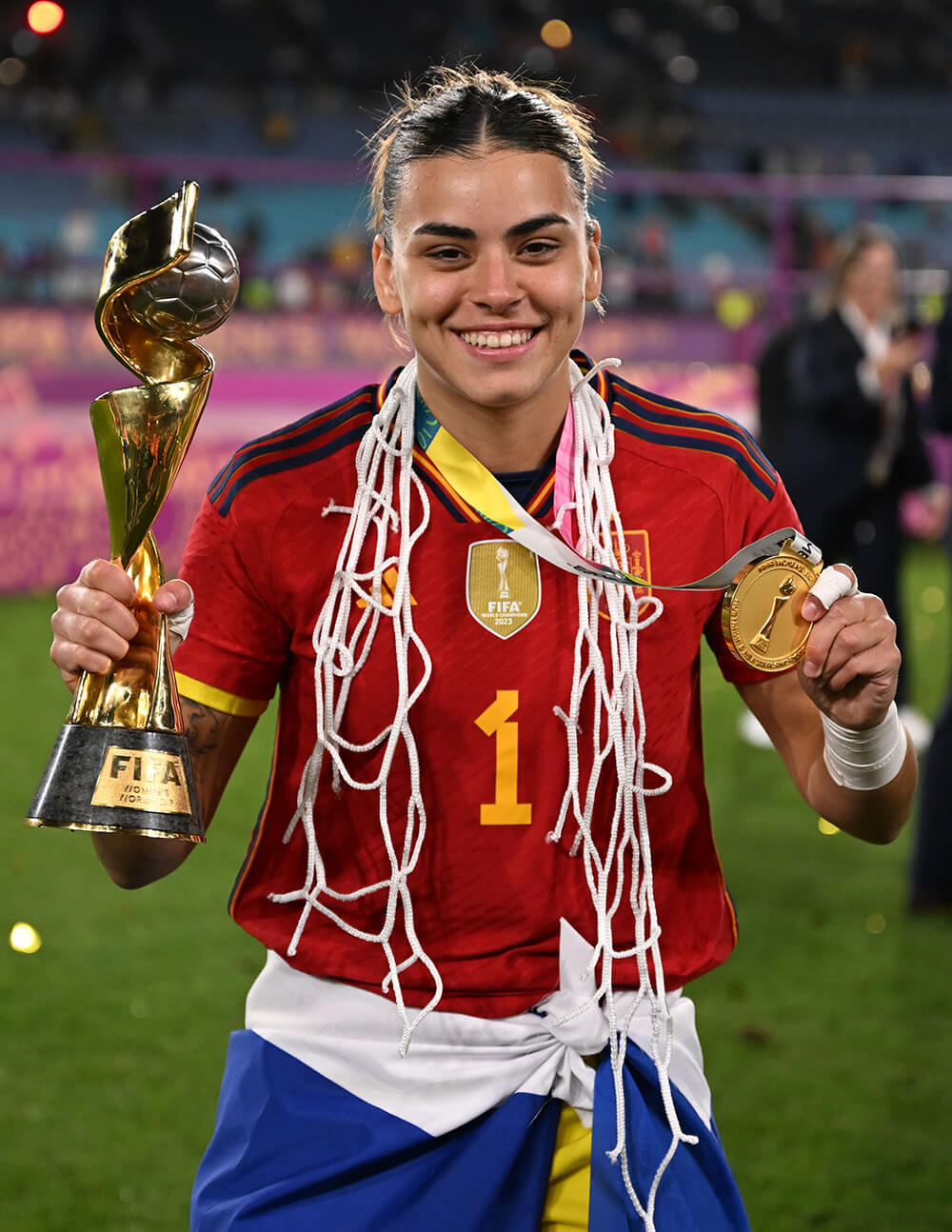 Image showing a Spanish Women's tema player posing with a trophy