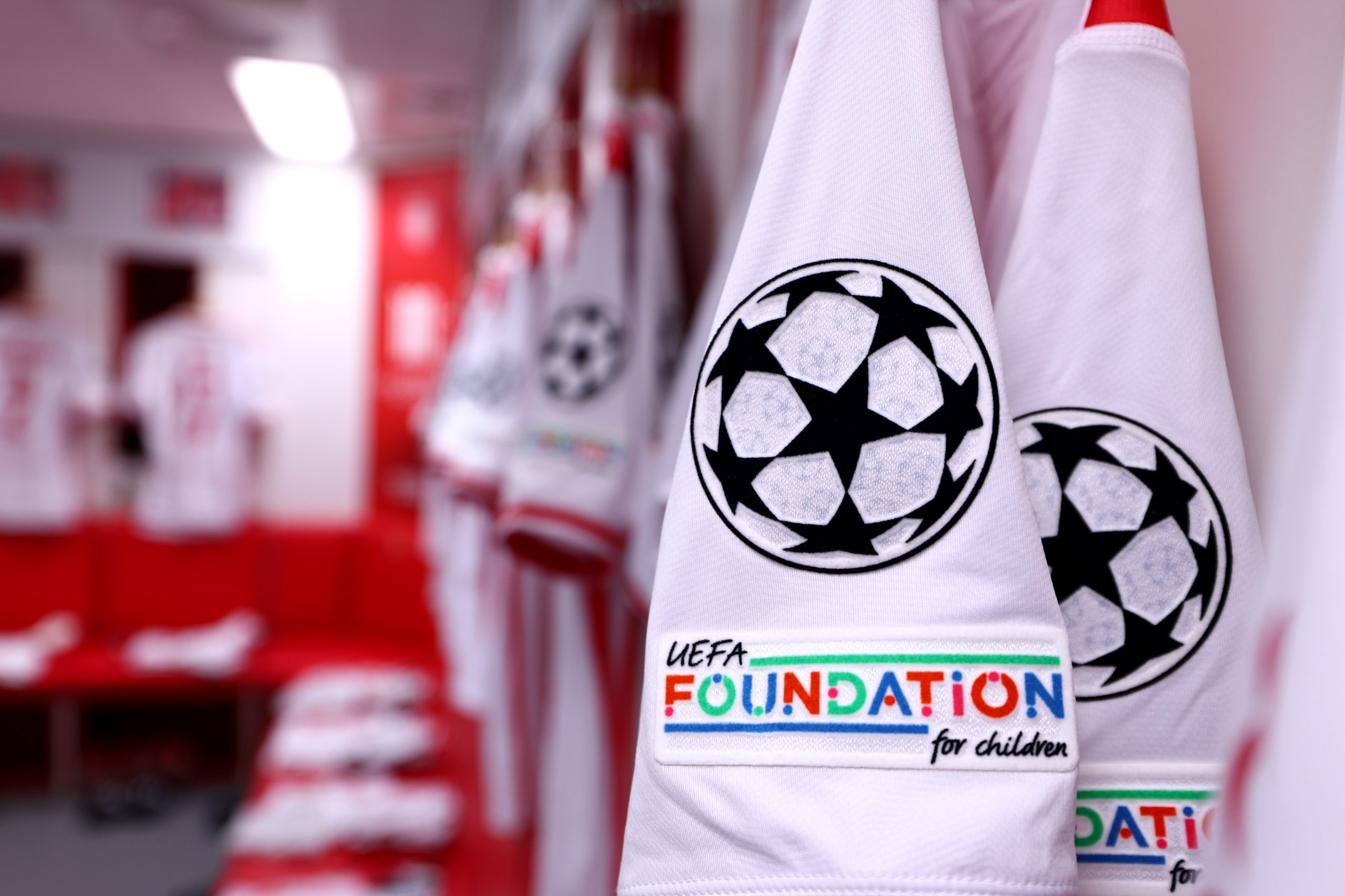A detailed view of the UEFA badge on the sleeve of a match shirt inside the AS Monaco dressing room
