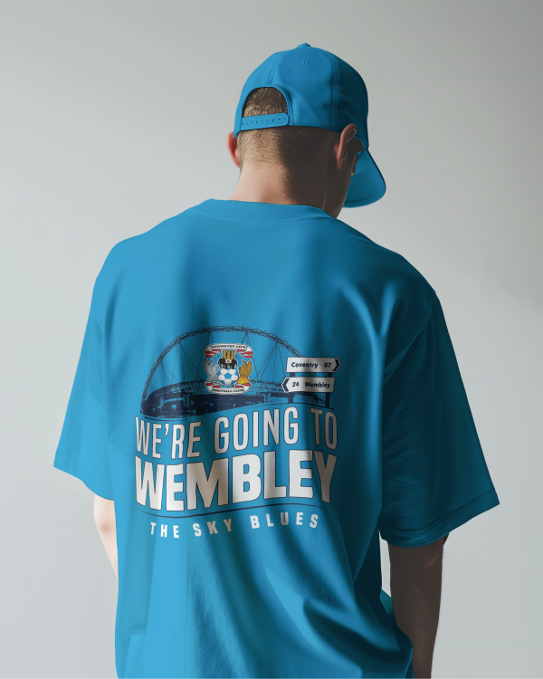 Image showing a model from behind wearing a Blue Coventry t shirt and hat celebrating their trip to Wembley Stadium